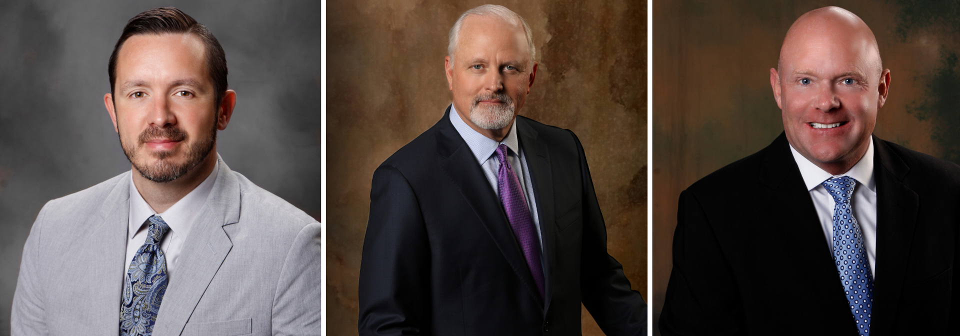 Three formal headshots of men in suits against neutral studio backdrops.