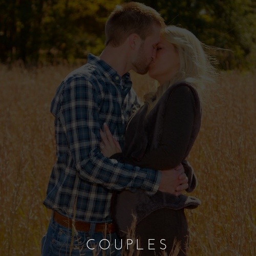 Couple embracing in a field at sunset, with the word “COUPLES” below.