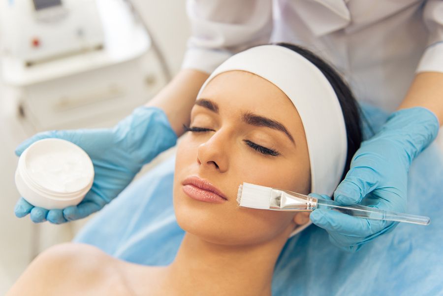A Woman is Getting a Facial Treatment at a Beauty Salon — Organic Beauty by Kessie in Yeppoon, QLD