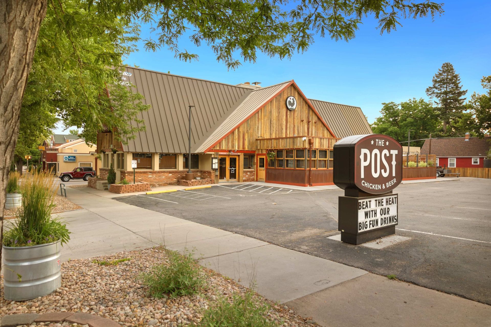 A building with a sign that says post on it