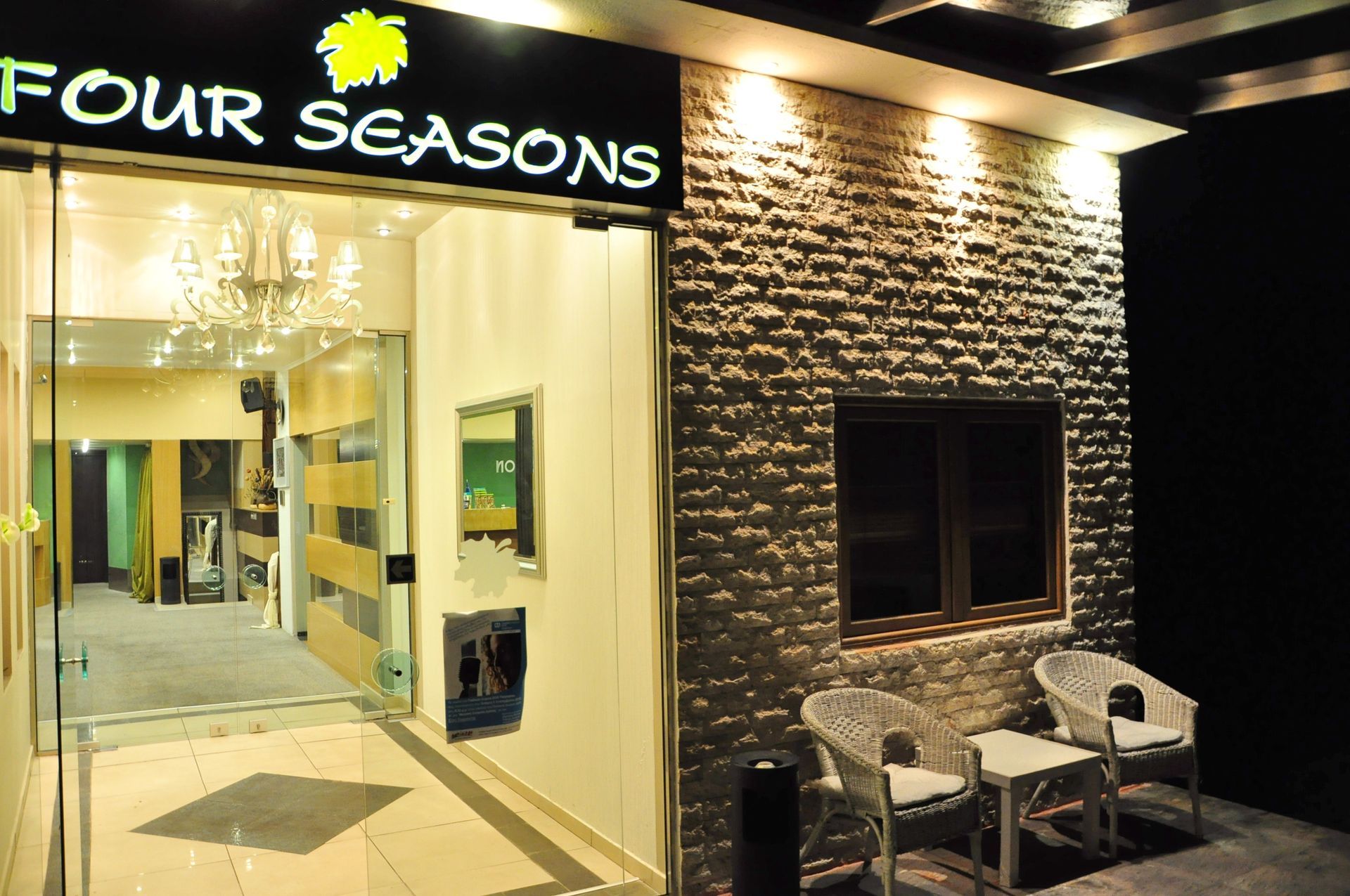 A building with a sign that says four seasons on it