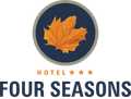 The logo for the hotel four seasons has a maple leaf on it.