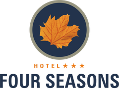 The logo for the hotel four seasons has a maple leaf on it.