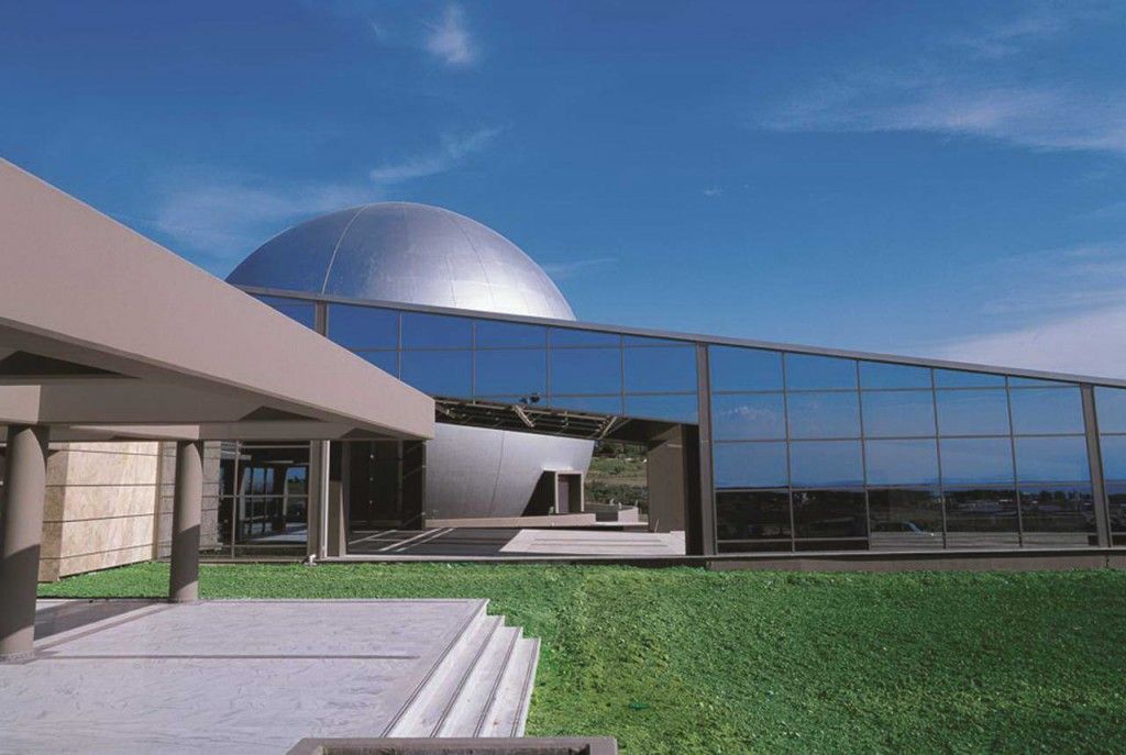 An artist 's impression of a building with a dome on top of it.