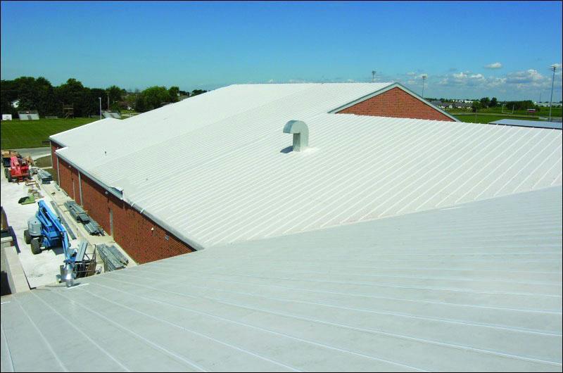 A building with a white roof and a red roof