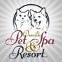 Logo for Greenville Pet Spa & Resort featuring two dog illustrations within a black circle; the text is in cursive and bold font.