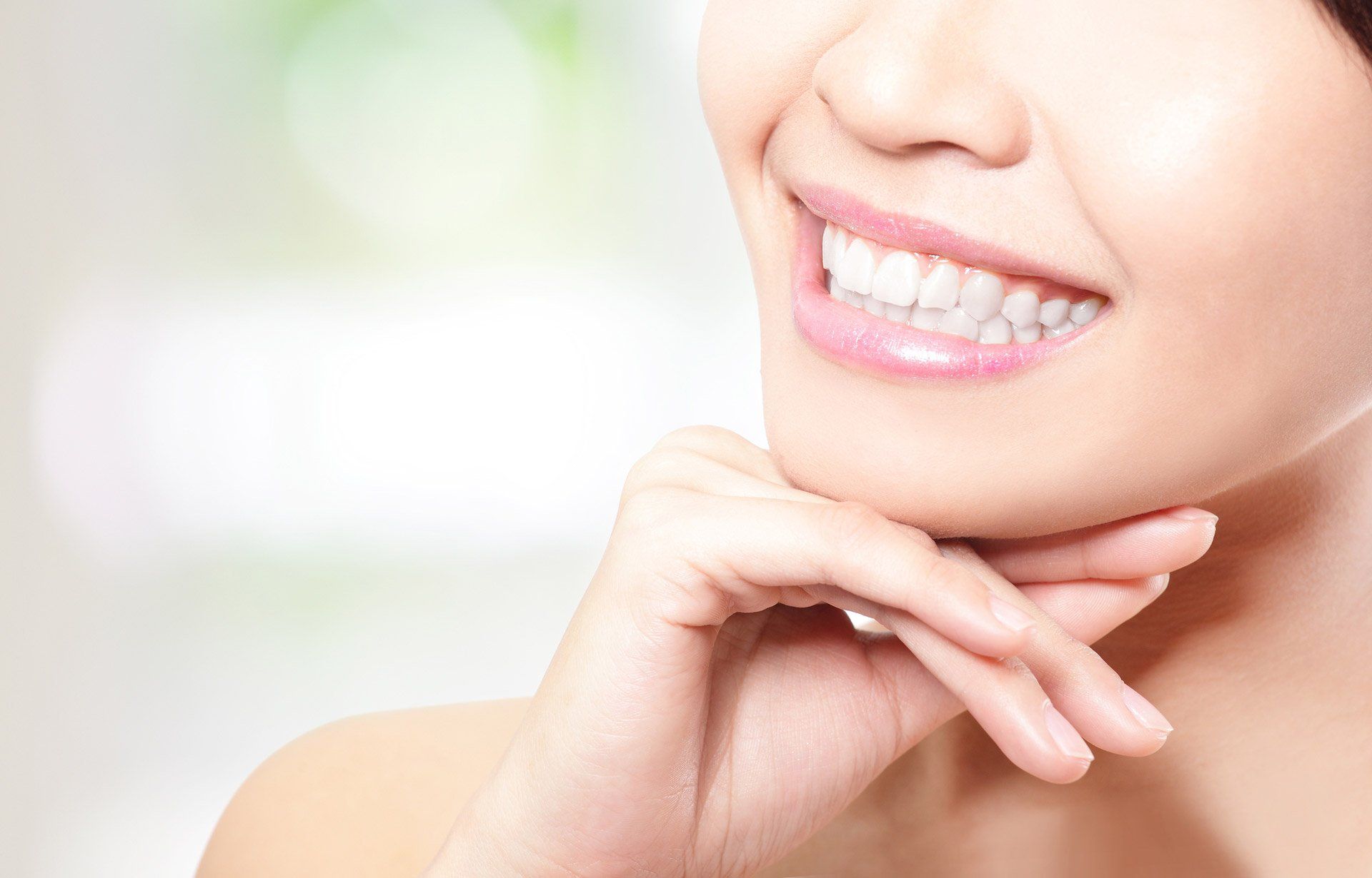 A woman smiling
