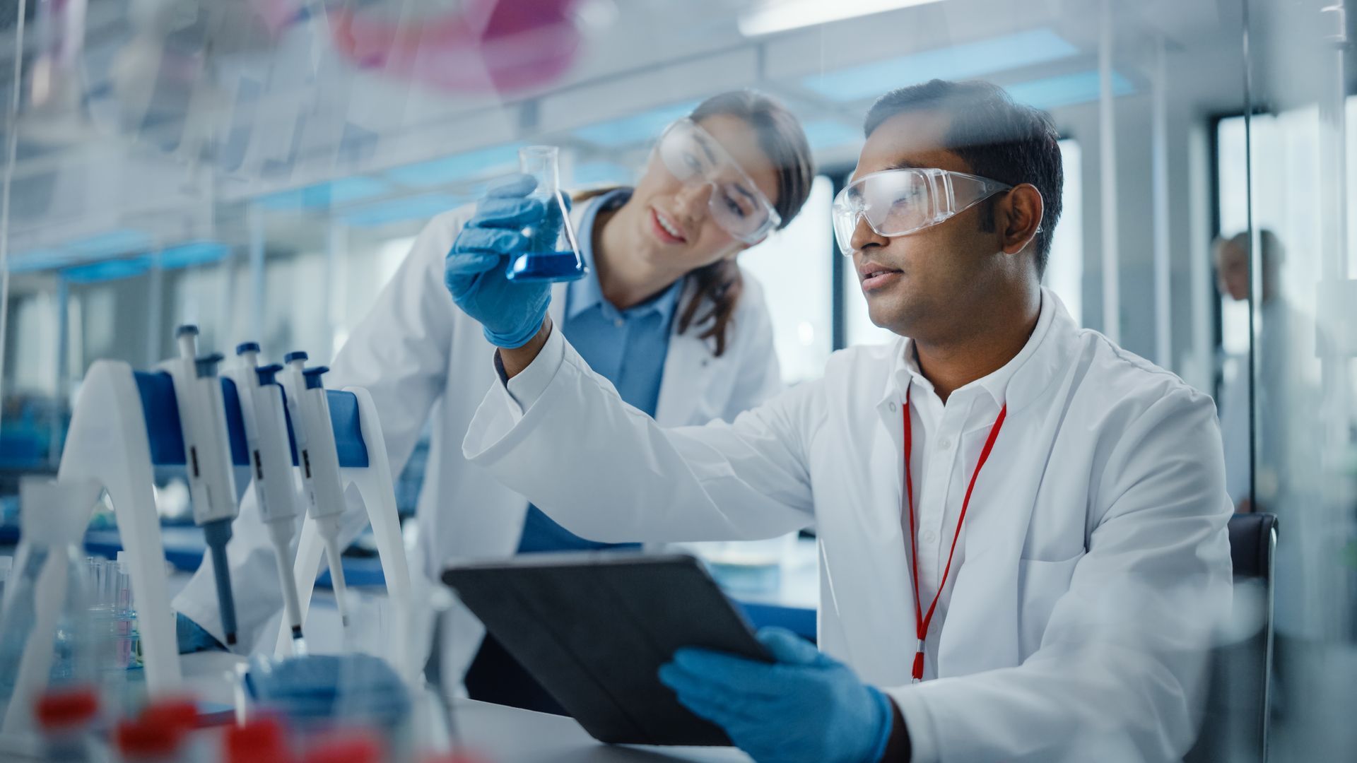 Two scientists working on an isopropyl alcohol alternative