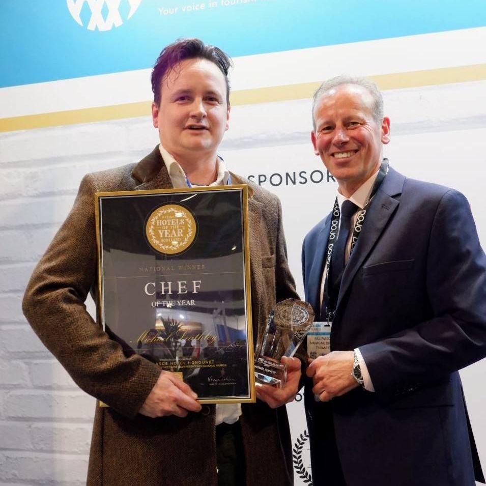 Michael Leathley, Head Chef at The Pierhouse Hotel, Argyll receives the Chef of the Year trophy from HOTYS President William Gorol at ScotHot Michael Leathley, Head Chef at The Pierhouse Hotel, Argyll receives the Chef of the Year trophy from HOTYS President William Gorol at ScotHot
