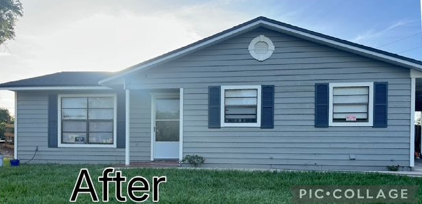 A picture of a house after being painted white.