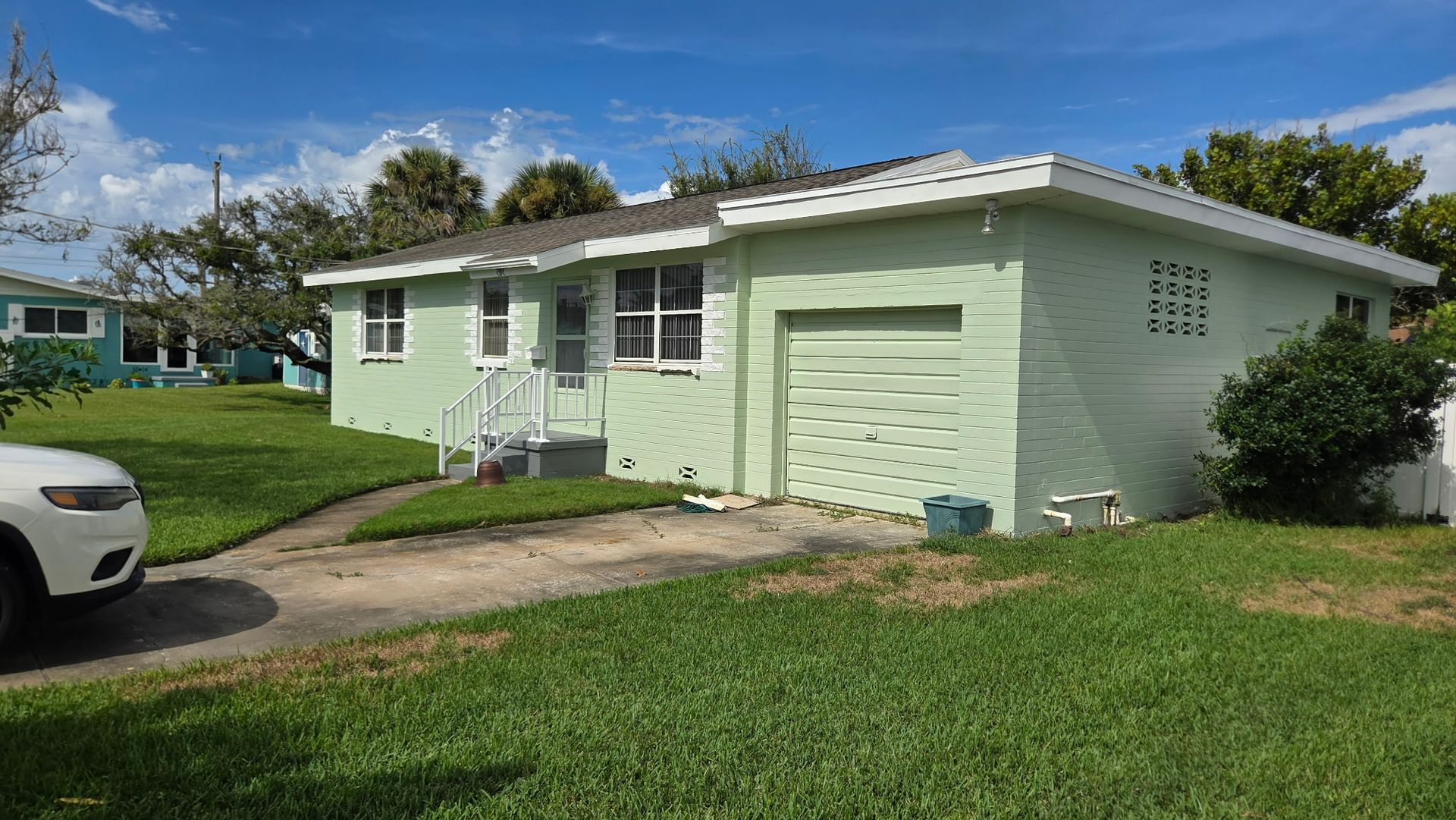 A picture of a house before and after being remodeled