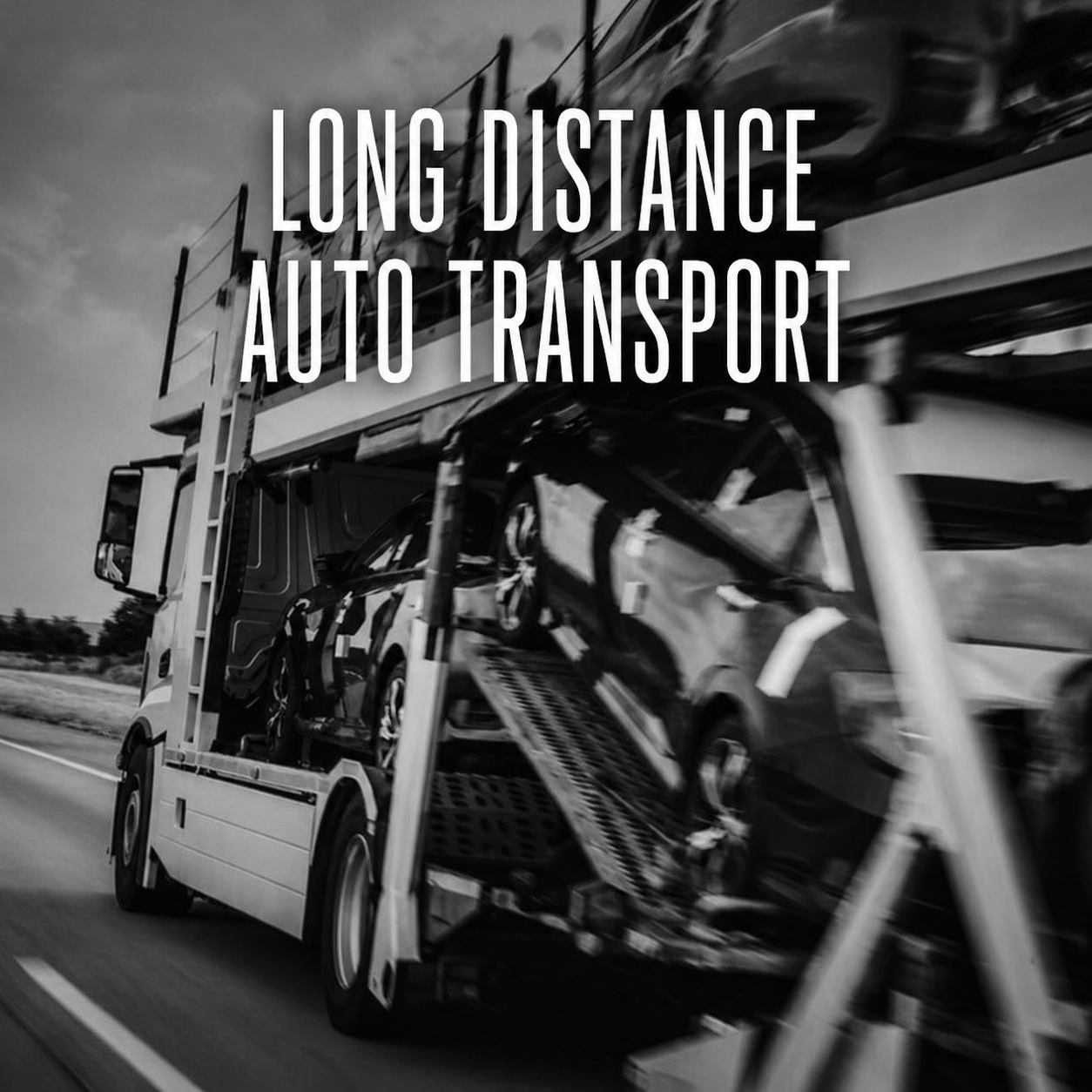 Black-and-white photo of a car carrier truck transporting vehicles with “LONG DISTANCE AUTO TRANSPORT” text.