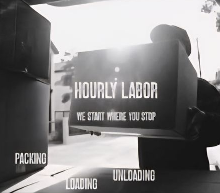 Worker carrying boxes labeled “HOURLY LABOR,” “WE STRIVE WHERE YOU STOP,” with “PACKING,” “LOADING,” and “UNLOADING” text.