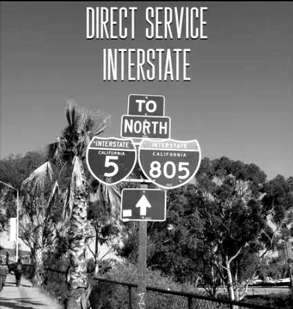 Road sign for direct service to Interstate 5 and 805 north in a rural area.