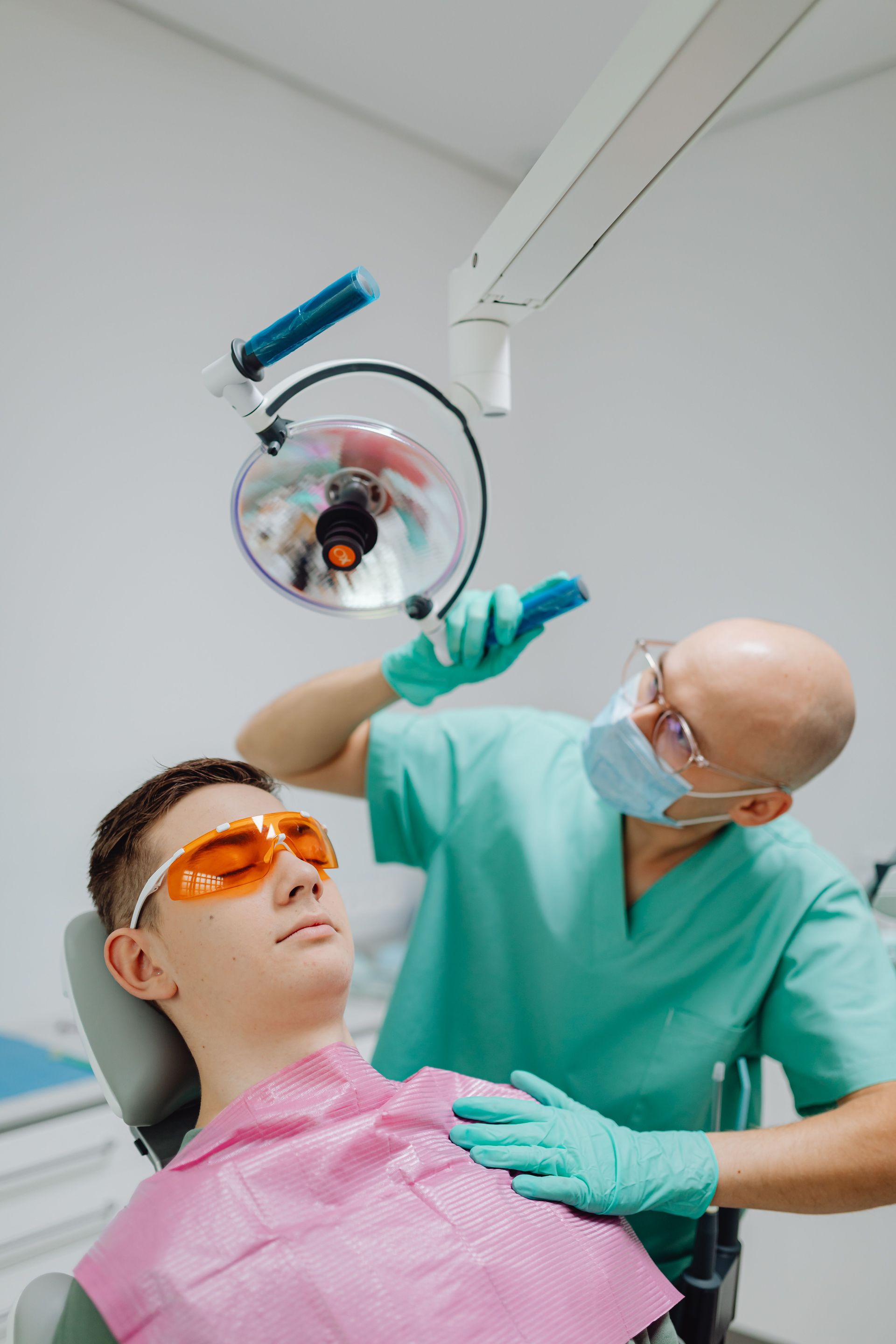 Dentist reviewing dental insurance plan benefits with patient