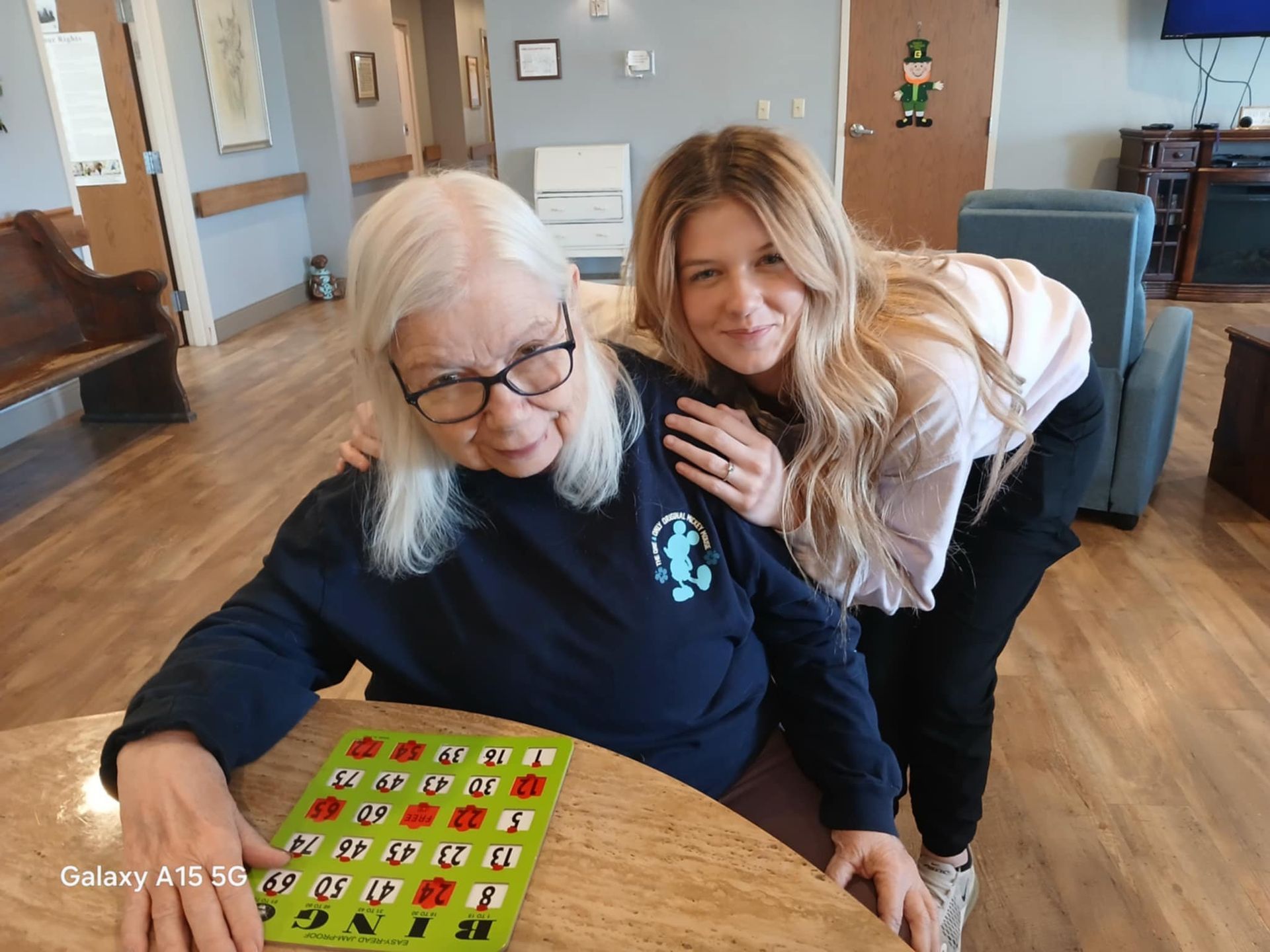 family visiting elderly at assisted living residence in ozark mo