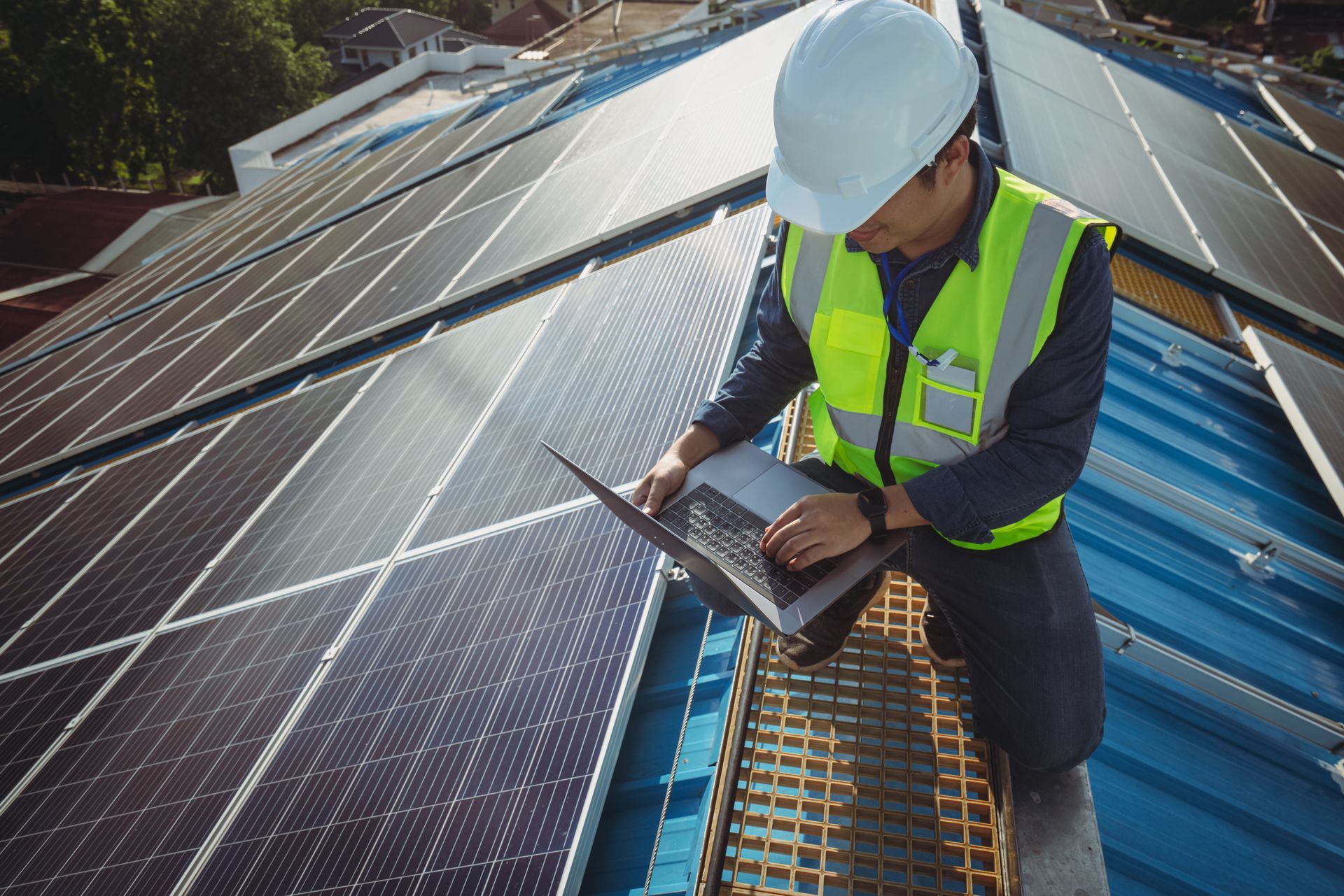 Contractor Installing Solar Panels on Roof | Switch to Solar Power