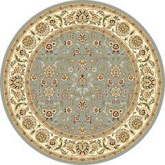 A round rug with a floral pattern on it on a white background.