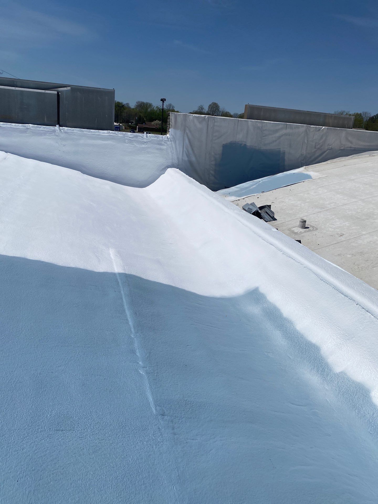 A roof with a lot of white paint on it