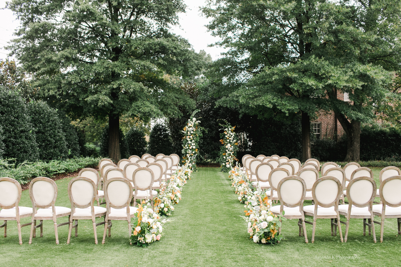 Outdoor Wedding Ceremony at The Merrimon-Wynne House, a wedding venue in Raleigh, NC