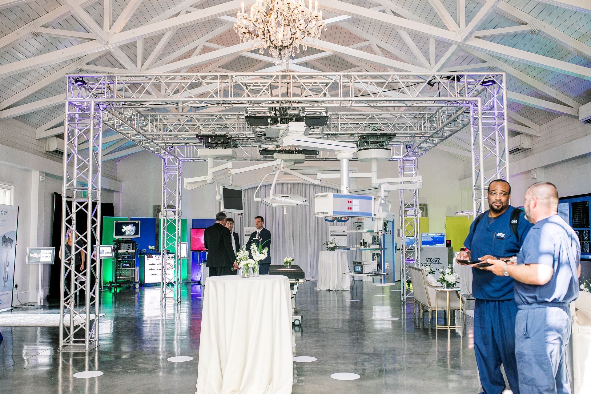Corporate event for a medical supply company at The Merrimon-Wynne House in Raleigh, NC with large displays of surgical and medical technology.