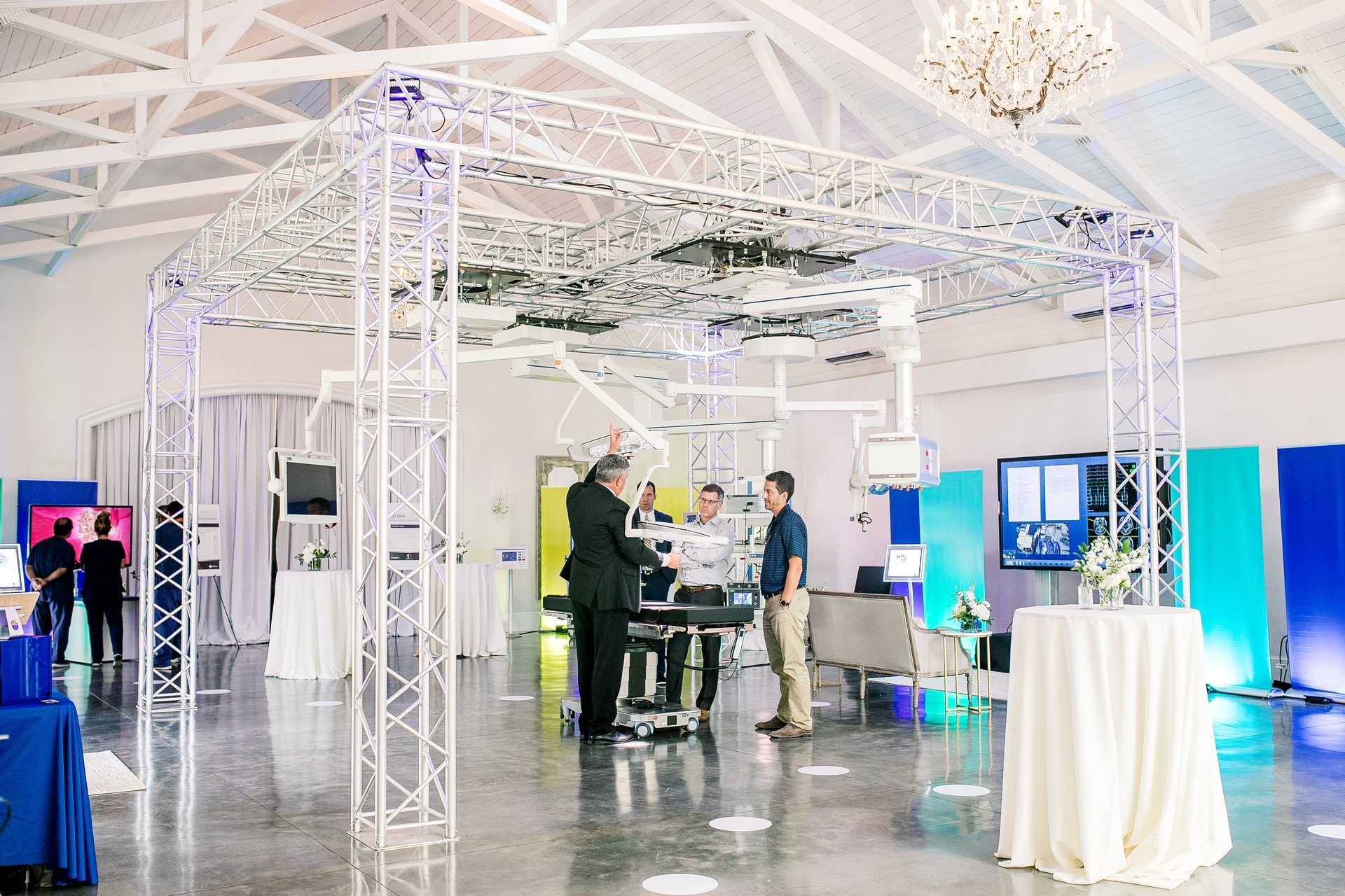 Corporate event for a medical supply company at The Merrimon-Wynne House in Raleigh, NC with large displays of surgical and medical technology.