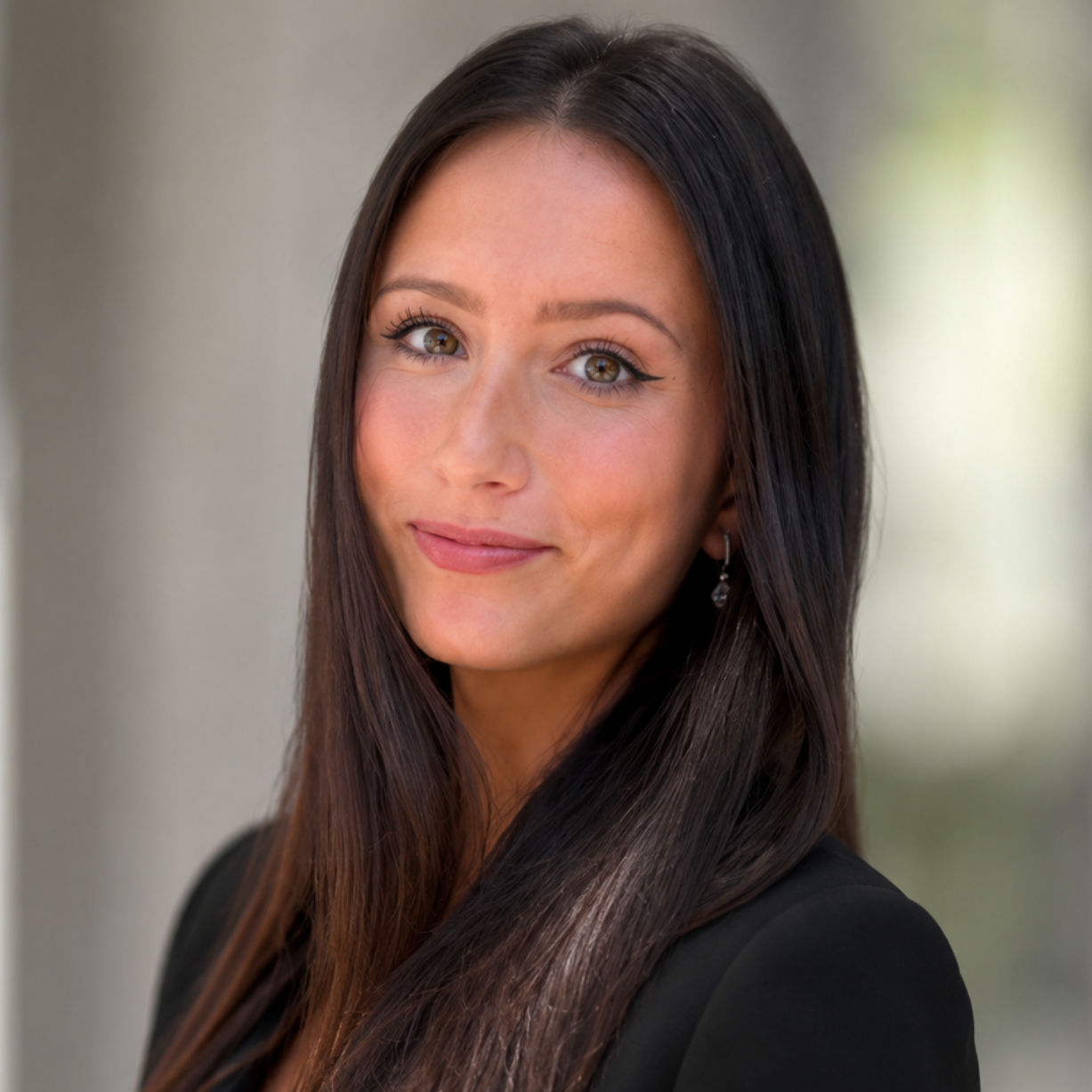 Headshot of Alixandra Adler.