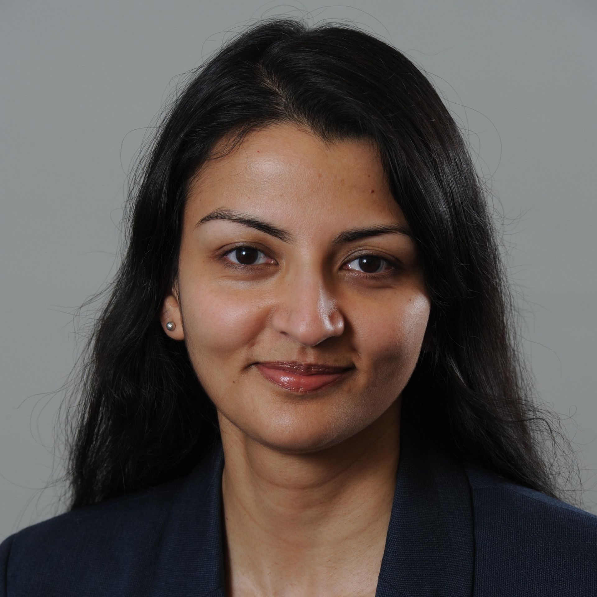Headshot of Ami Gandhi.