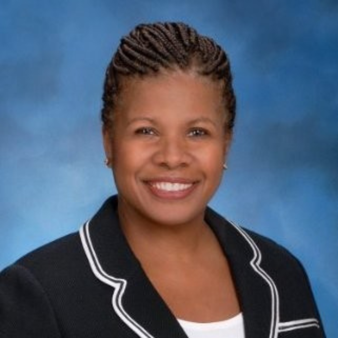 Headshot of Deneen Donnley.