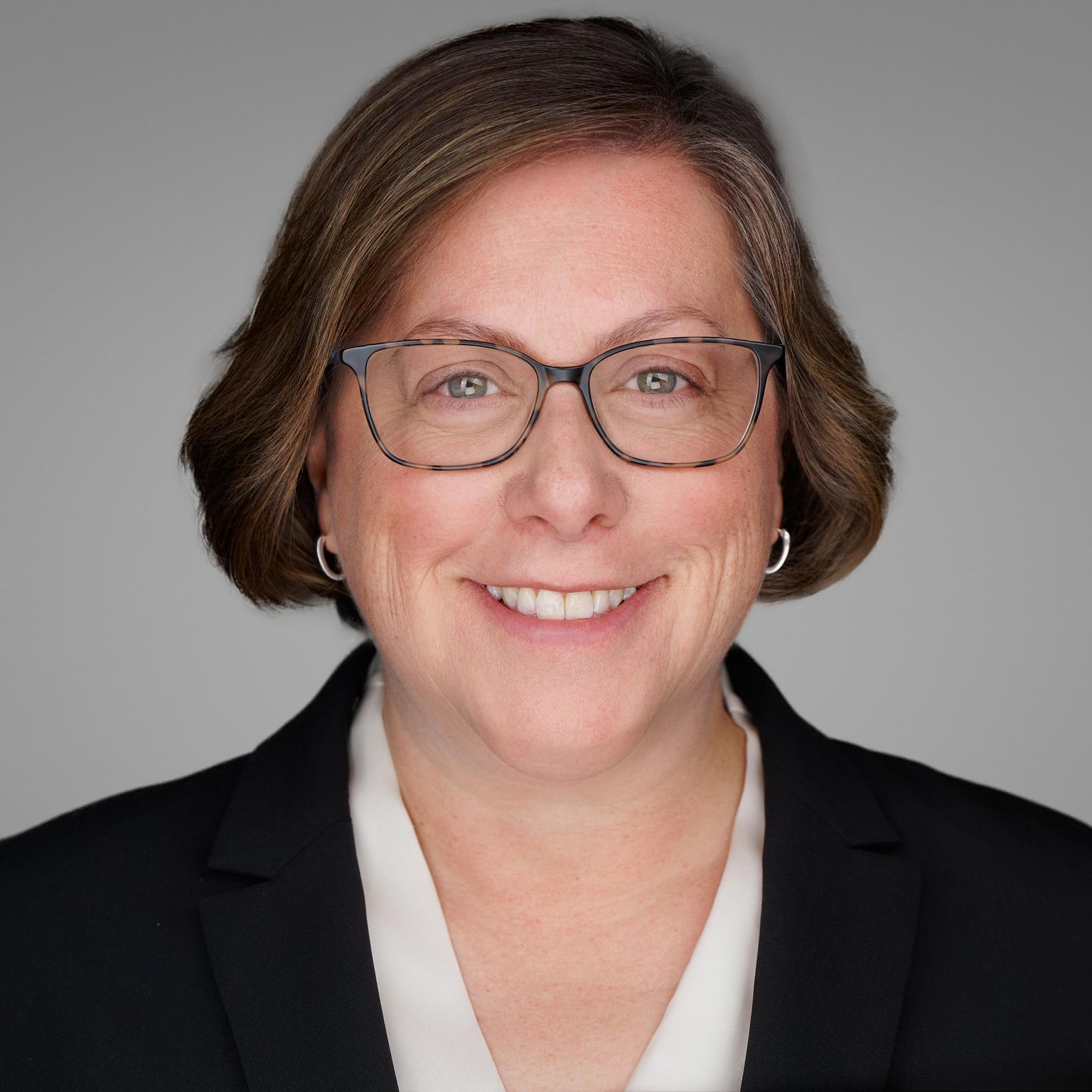Headshot of Kari Sheinfeld. 