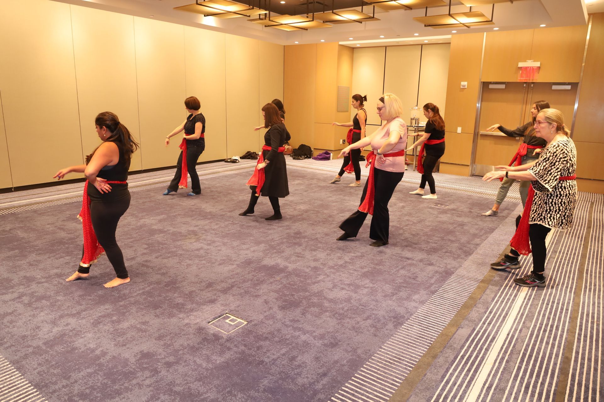Attendees learn a Bollywood dance. 