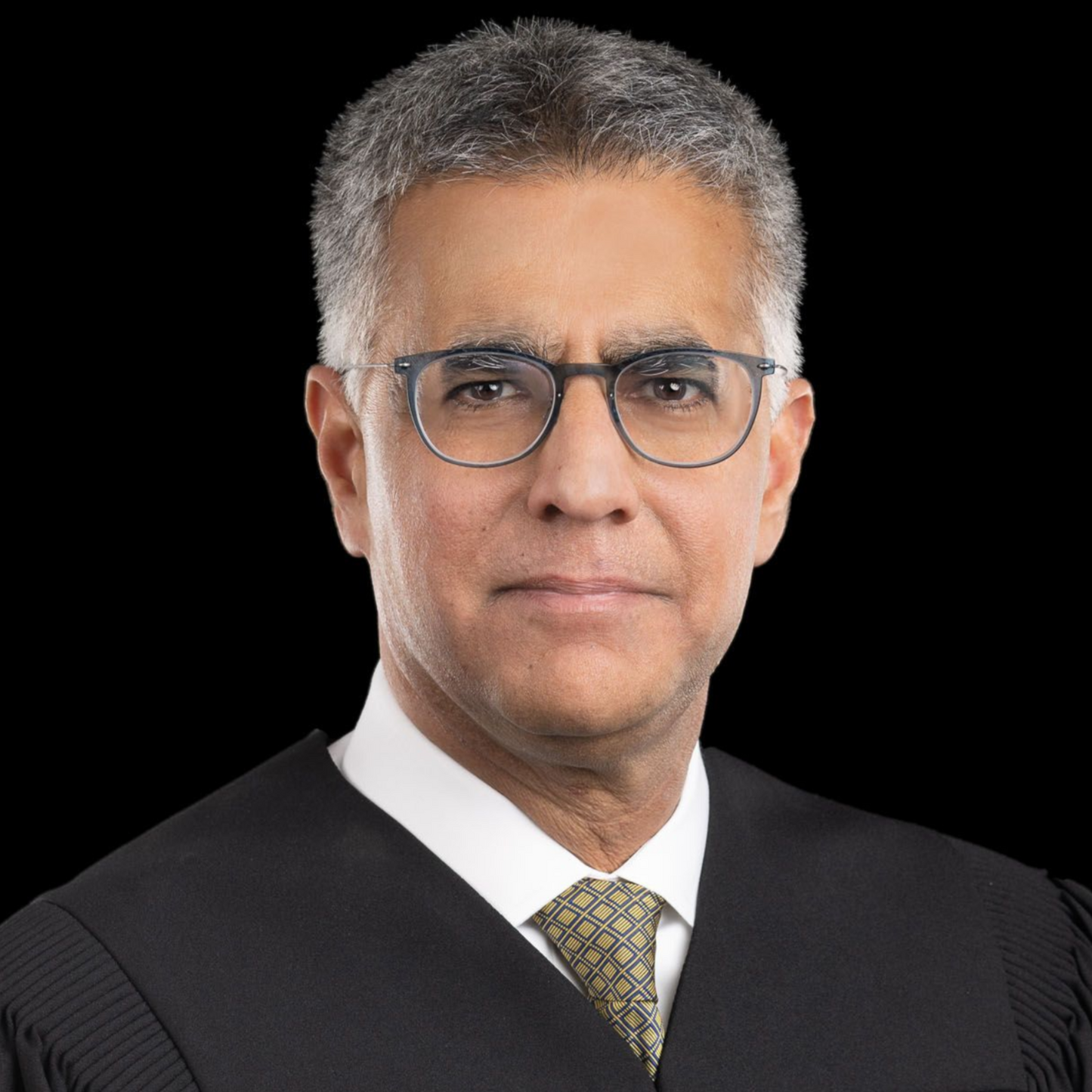 Headshot of Sanjay Tailor. 