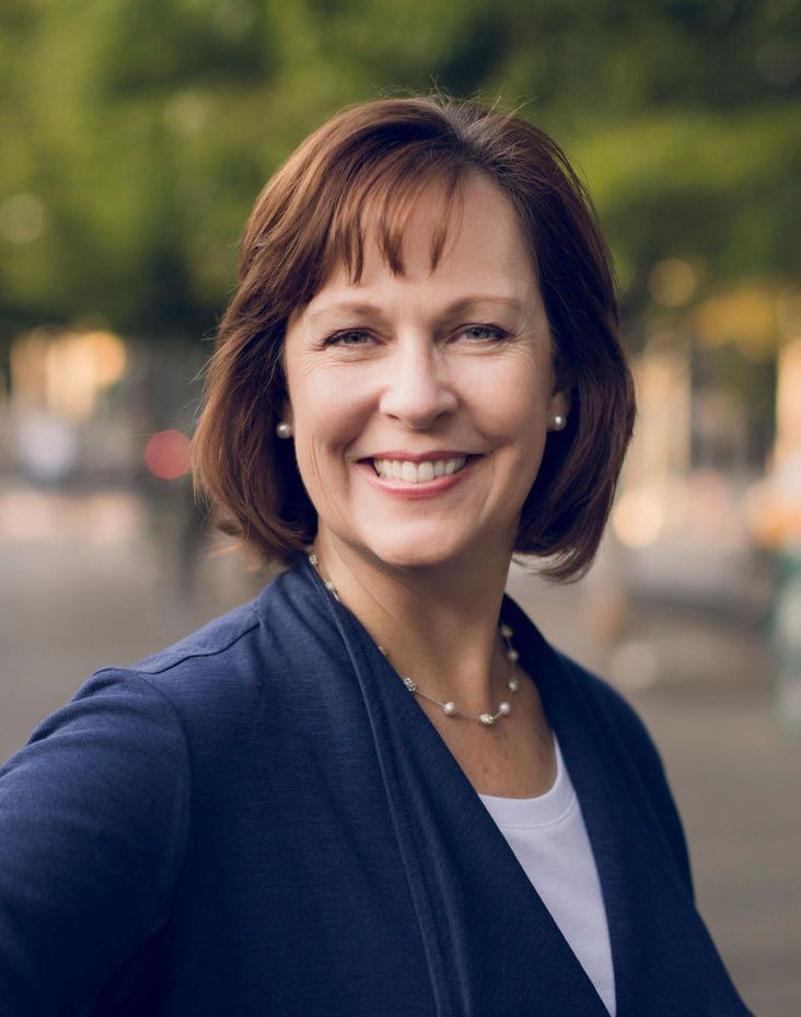 Headshot of Kirsten C. Meneghello.