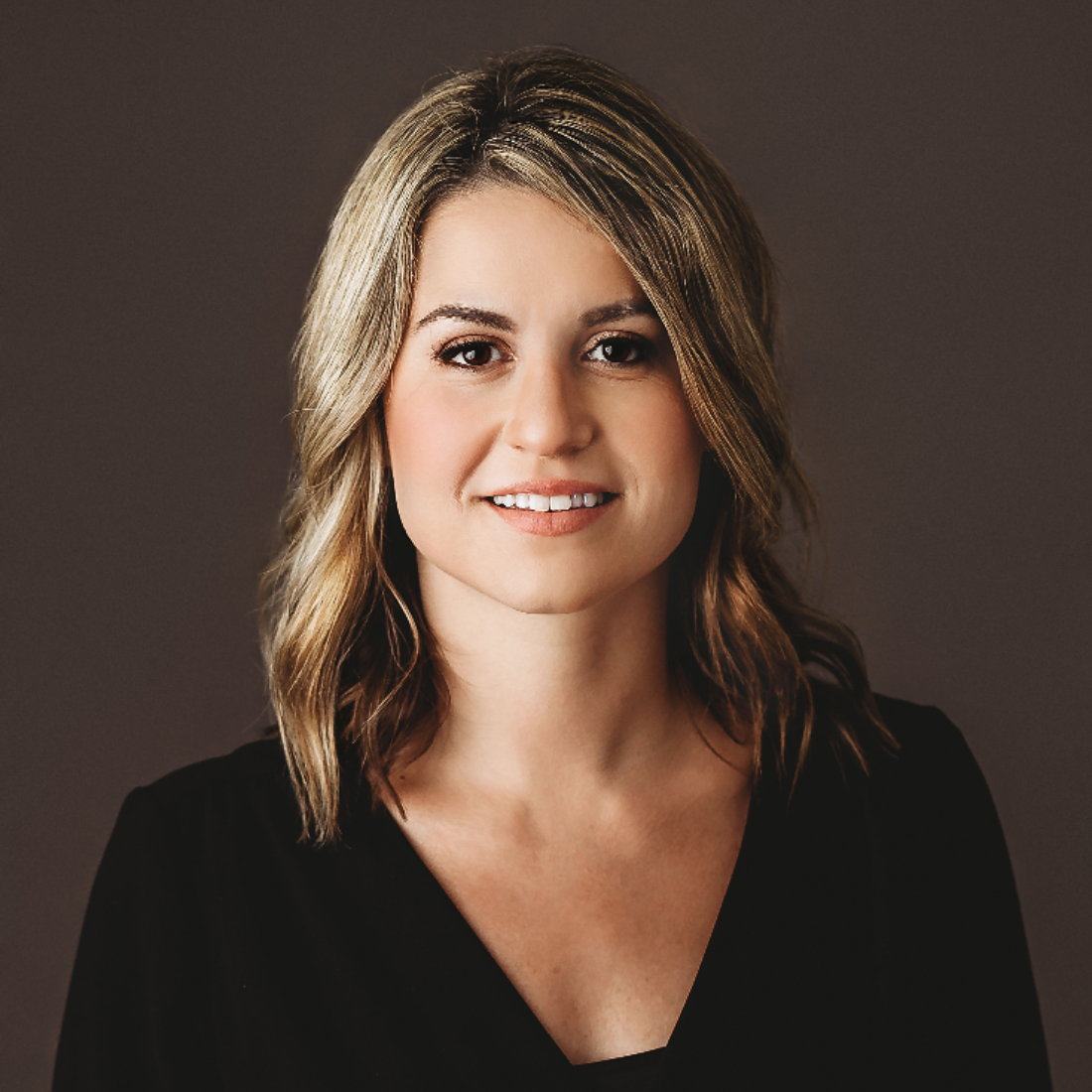 Headshot of Jenna Comizio Guarino. 