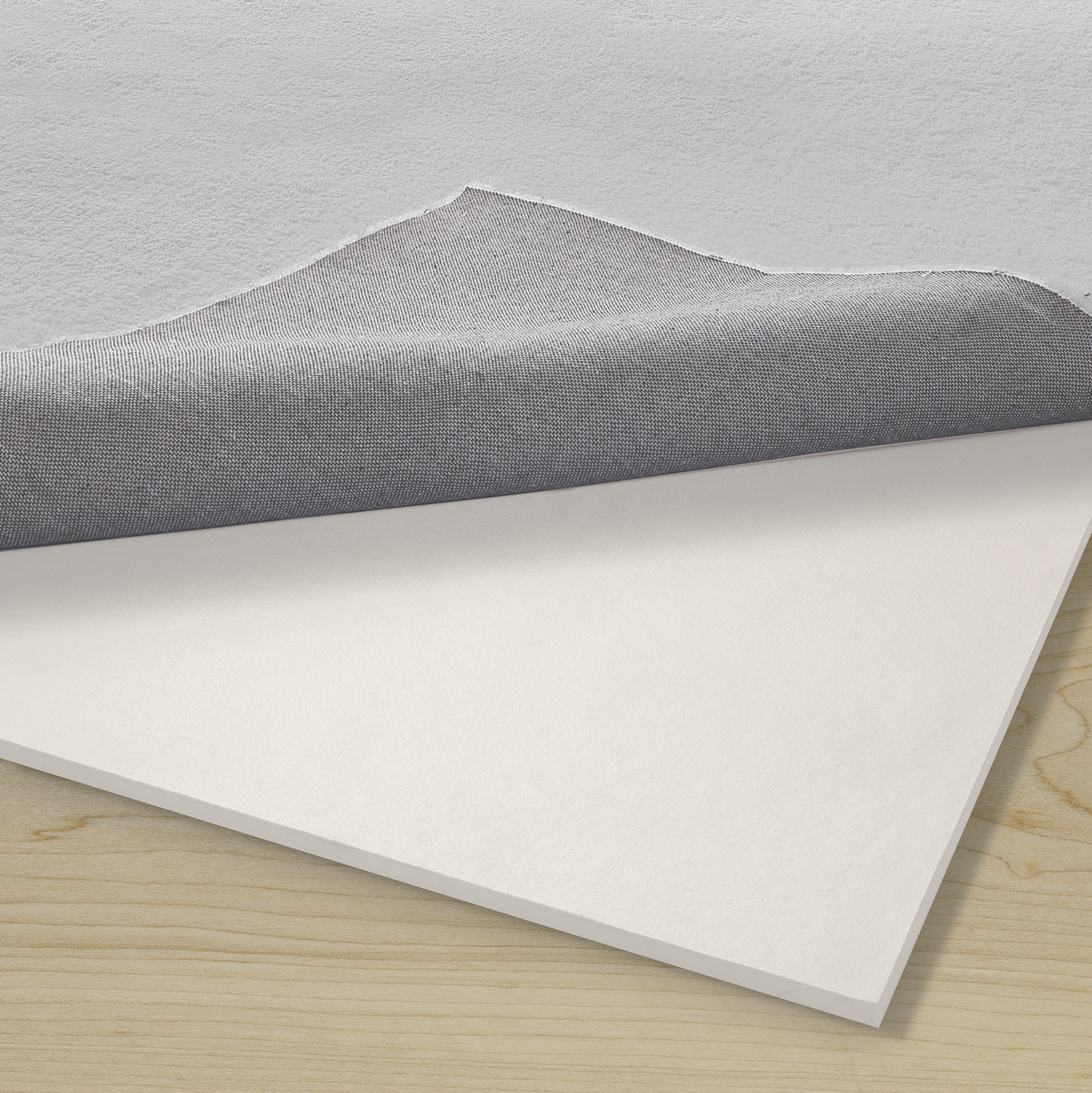 Healthier Choice Carpet cushion with carpet pulled back to reveal the underlying carpet pad.
