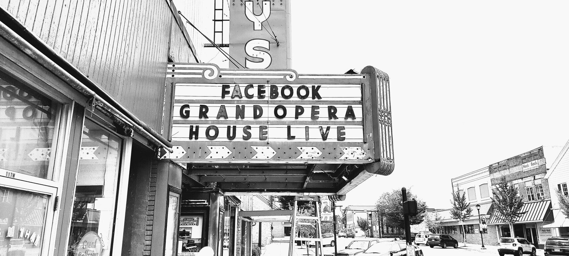 A black and white photo of a facebook grand opera house