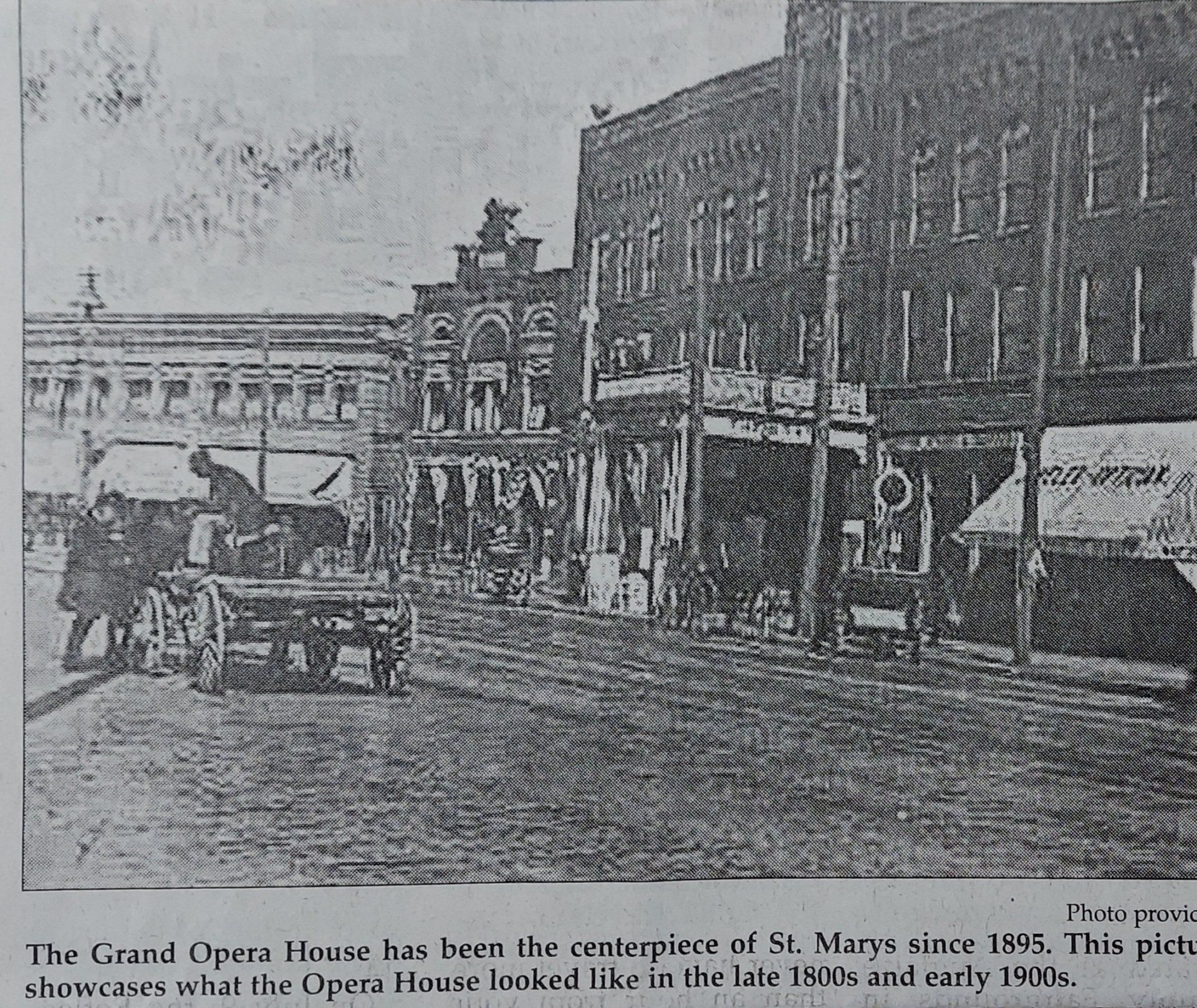 A black and white photo of the grand opera house