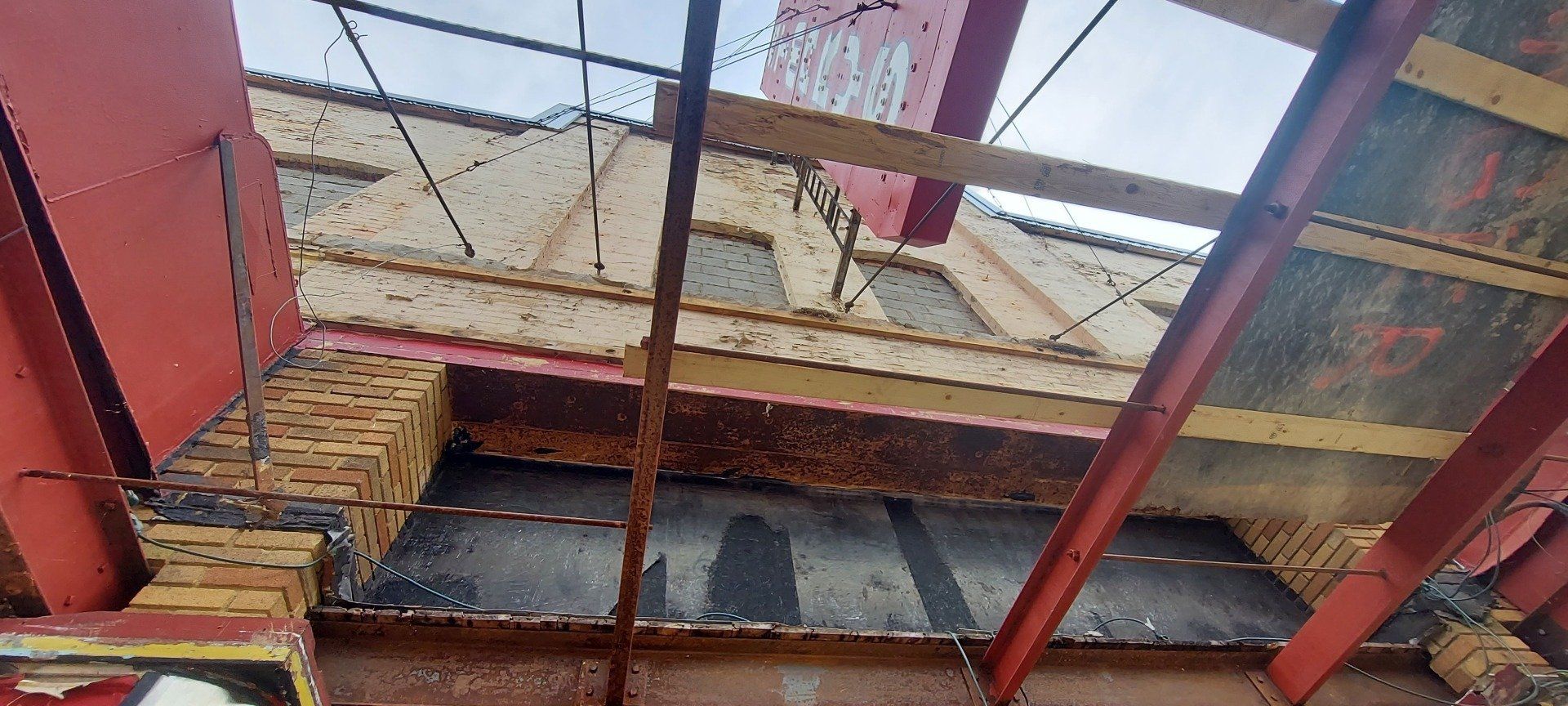 Looking up at the ceiling of a building.