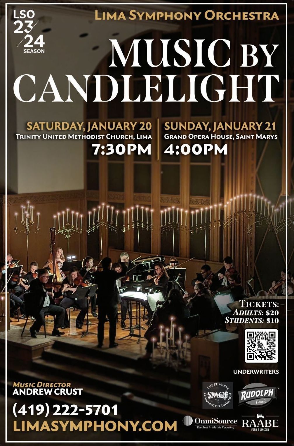 The lima symphony orchestra is playing music by candlelight.