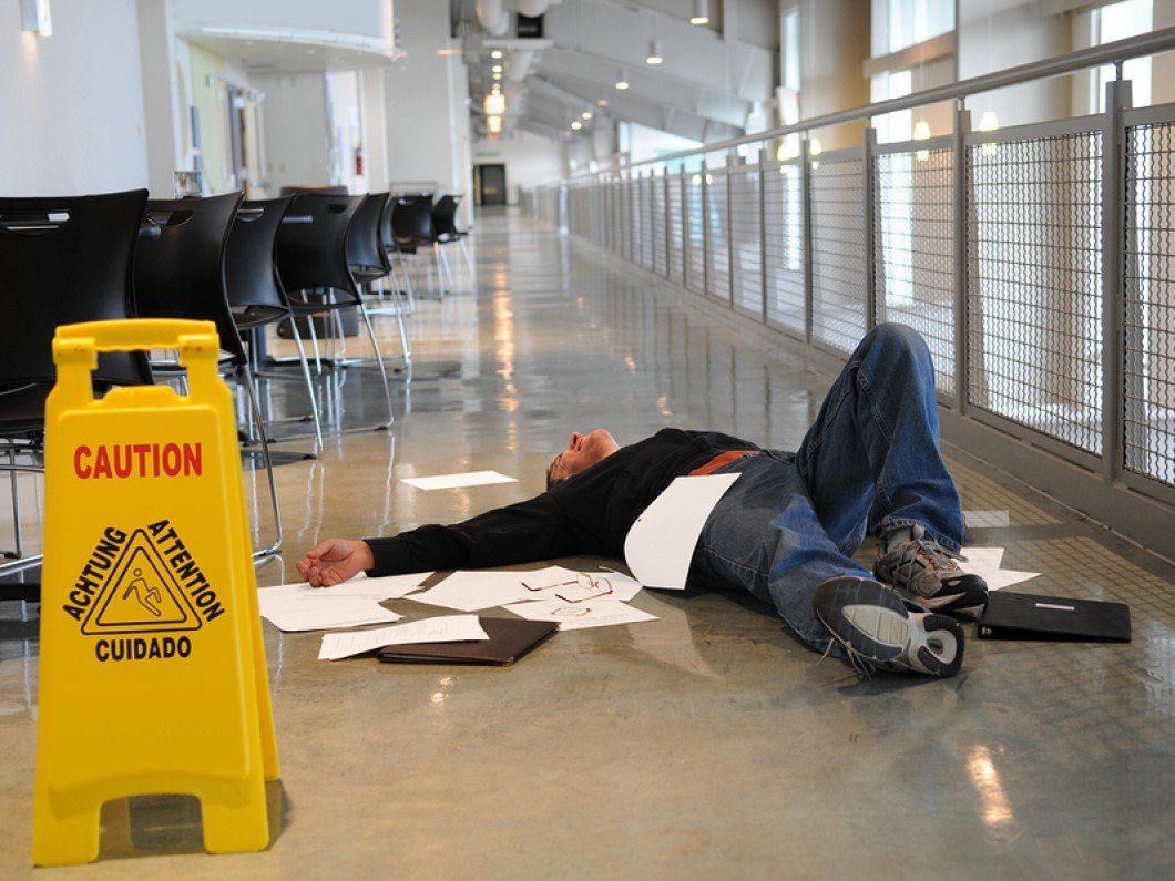 Man-Fallen-On-Wet-Floor