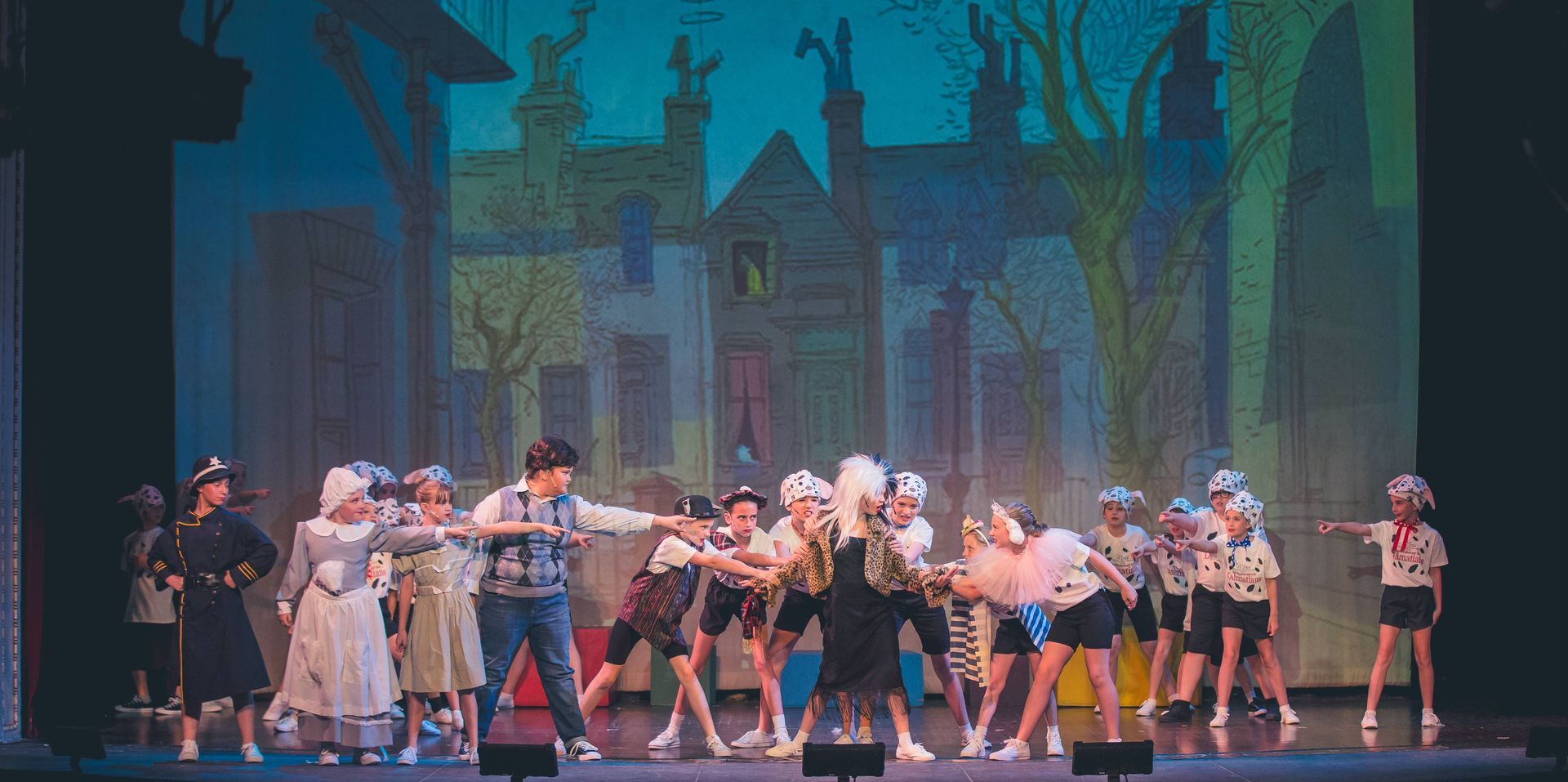 Group of theater children performing on a theater stage at Moss Performing Arts Academy at Moss Per