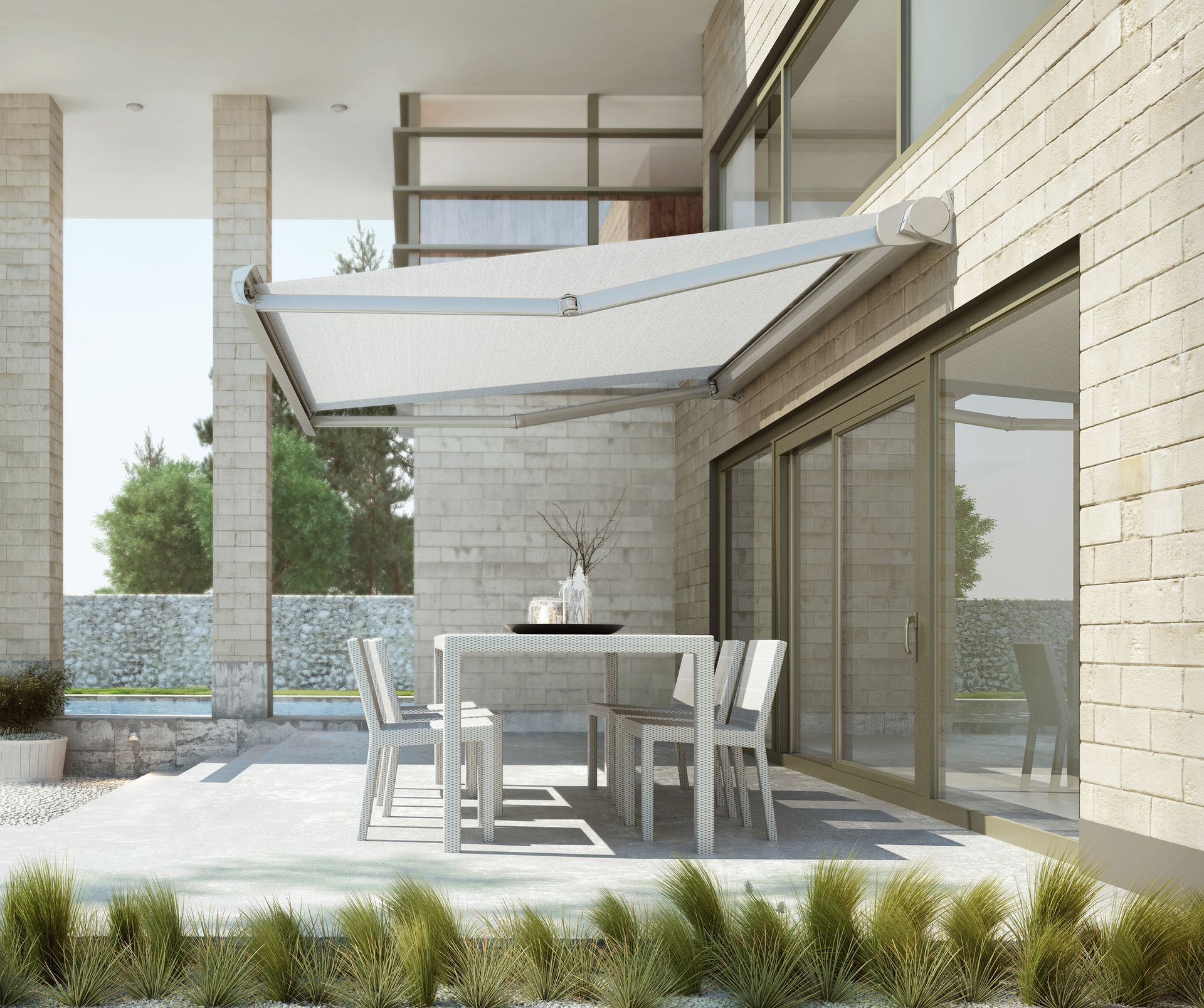 Outdoor patio with white retractable awning - Residential Awnings, Awning Company
