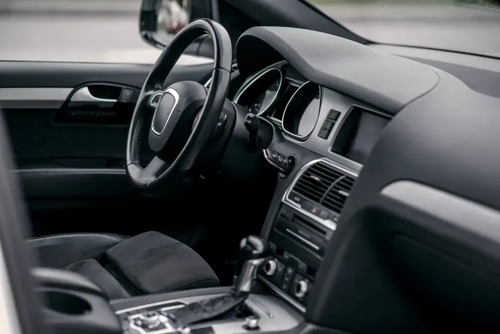 Car Interior, Dashboard and Steering Wheel Visible, Black and Silver Details — B Wild Auto Repairs In North Gosford, NSW