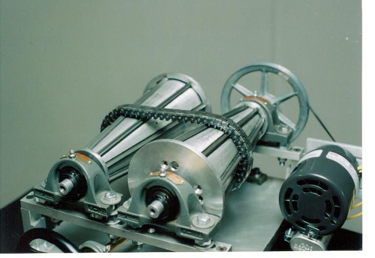 A close up of a machine with a chain around it