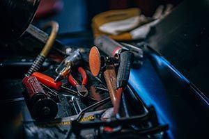 A bunch of tools are sitting on top of a table.