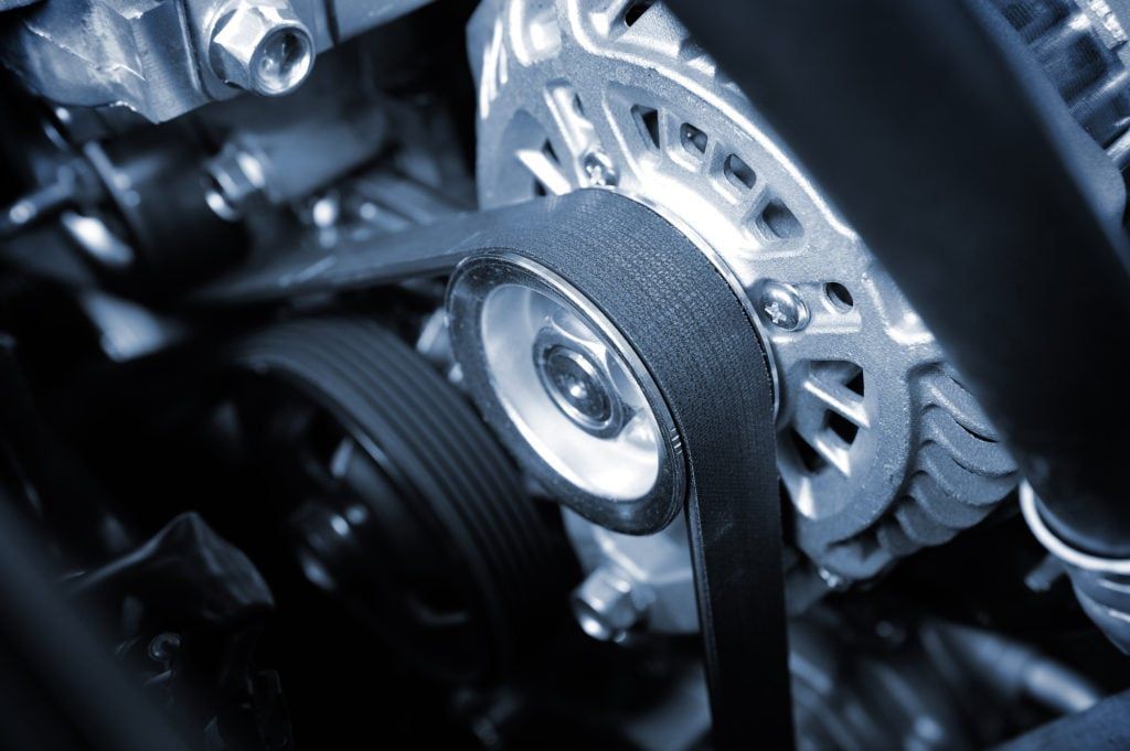 A close up of a belt on a car engine