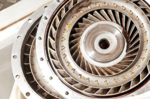A close up of a turbine with a hole in the middle.