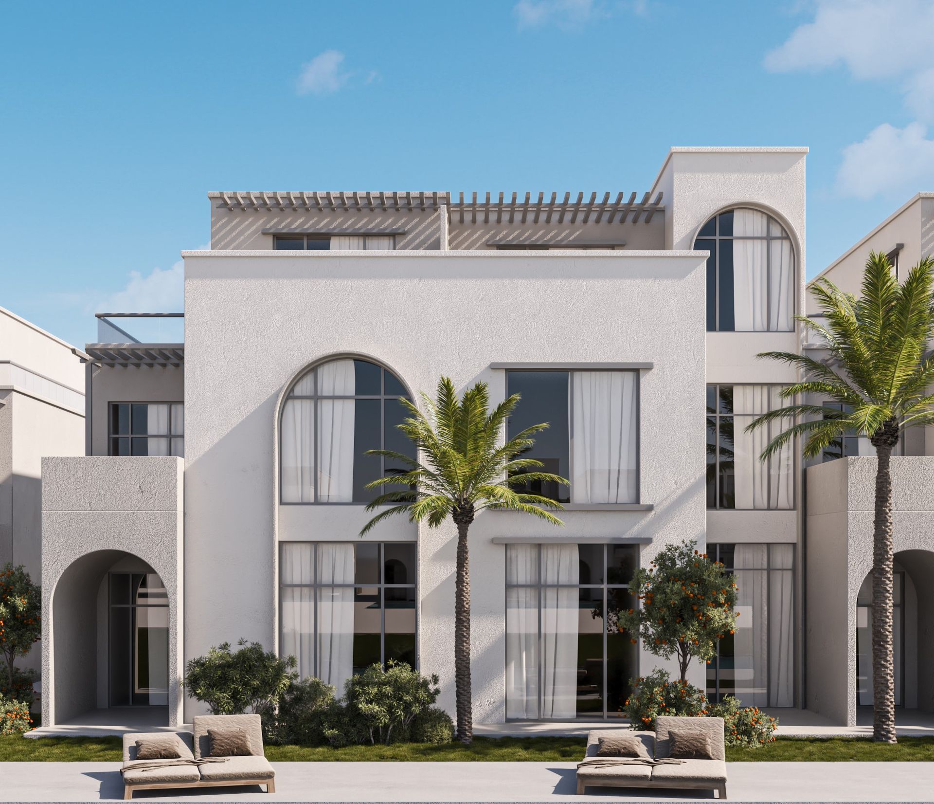 Modern white villa with arched windows, palm trees, and lounge chairs by the entrance