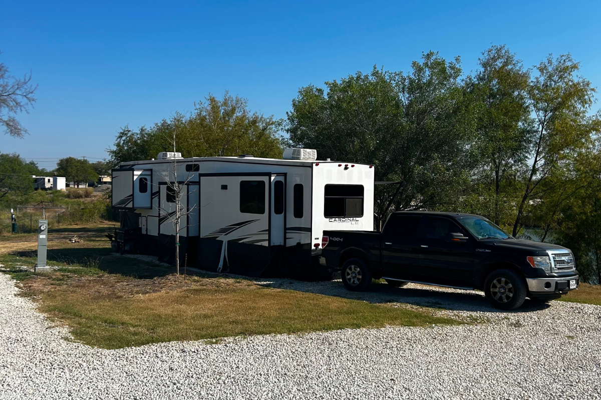 placeholder a rv is parked in the middle of a forest