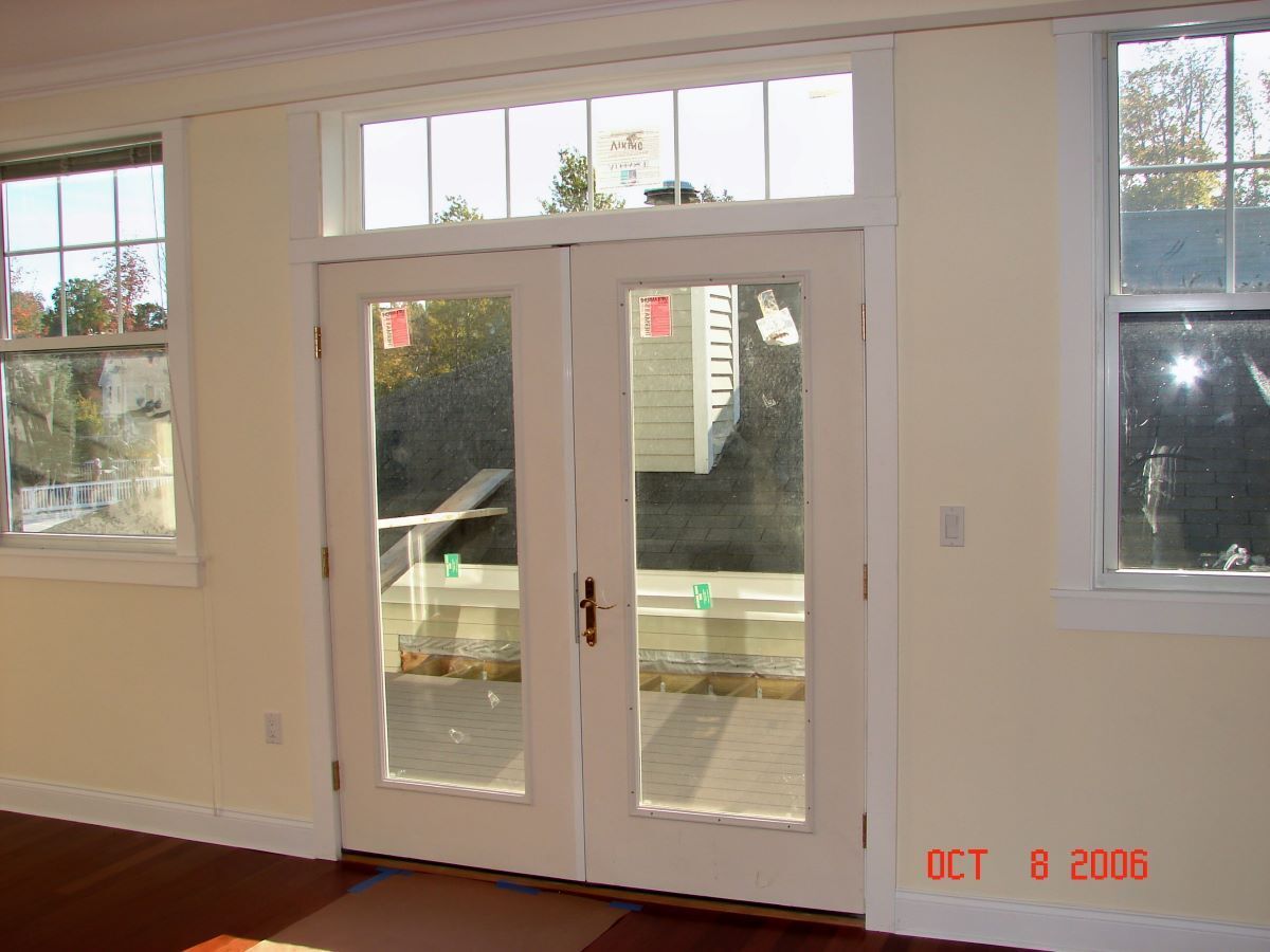 An empty room with two doors and two windows on october 8 2006